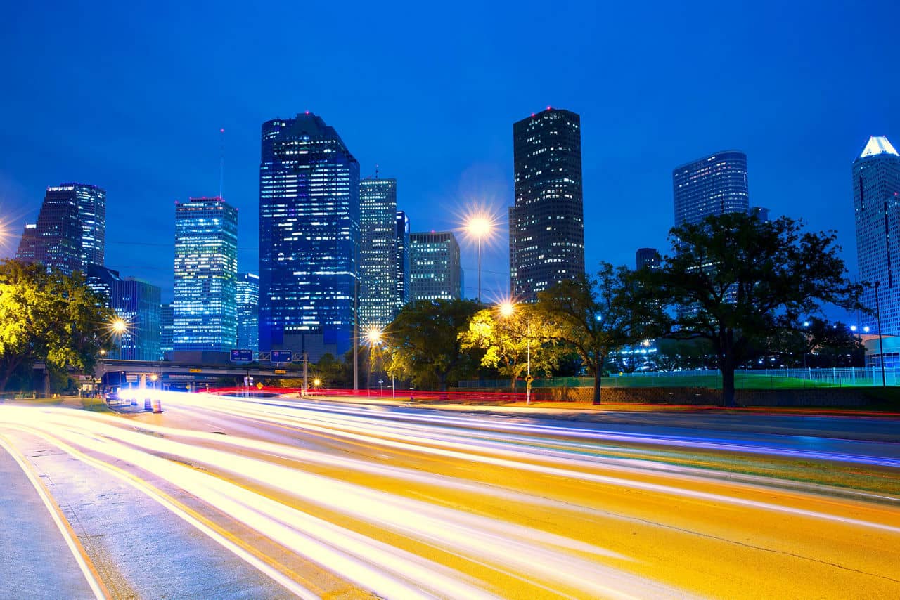 Houston Texas skyline at sunset with traffic lights